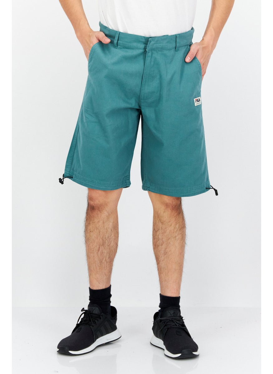 FILA Men Sportswear Fit Teunz Skater Short, Green  - Image 1
