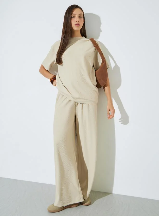ستايلي Cream Textured Wide Leg Pants with Elastic Waistband