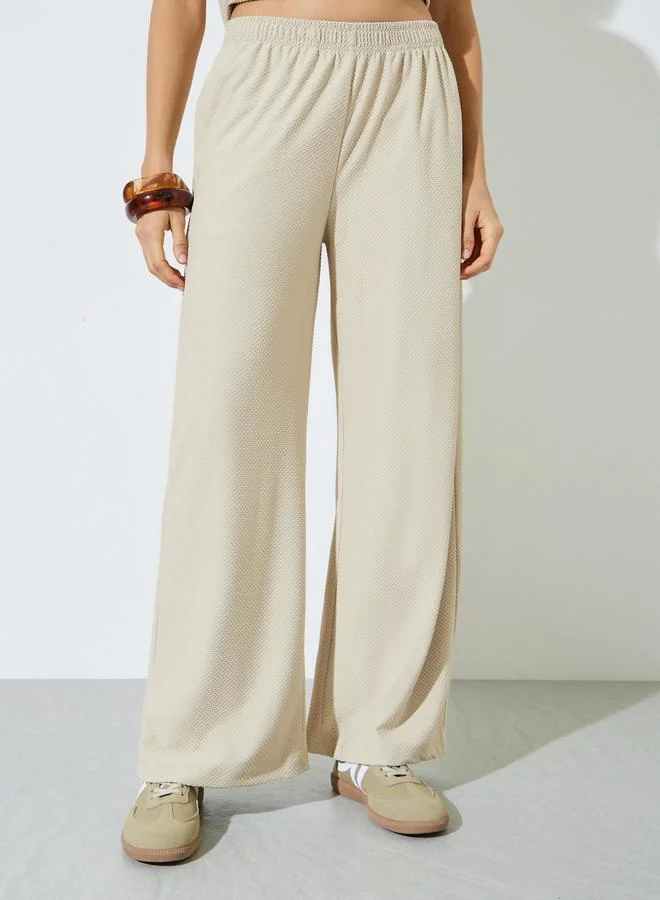 ستايلي Cream Textured Wide Leg Pants with Elastic Waistband