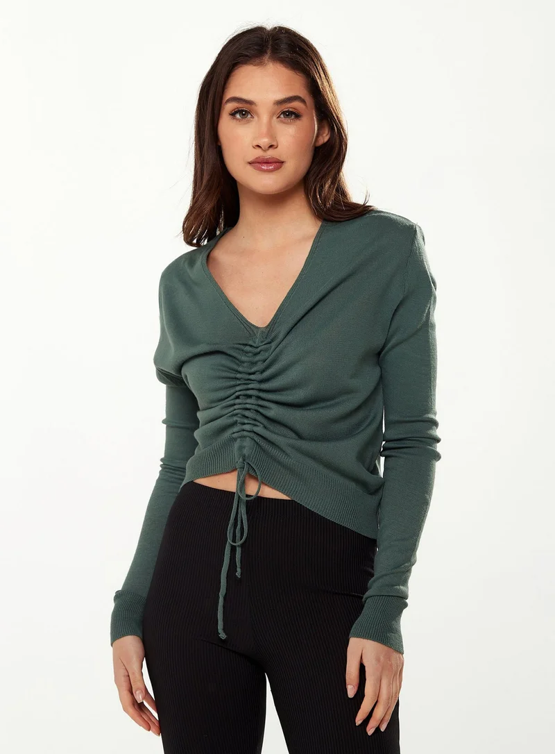 Liquorish V-Neck Top with Ruching Detail in Green