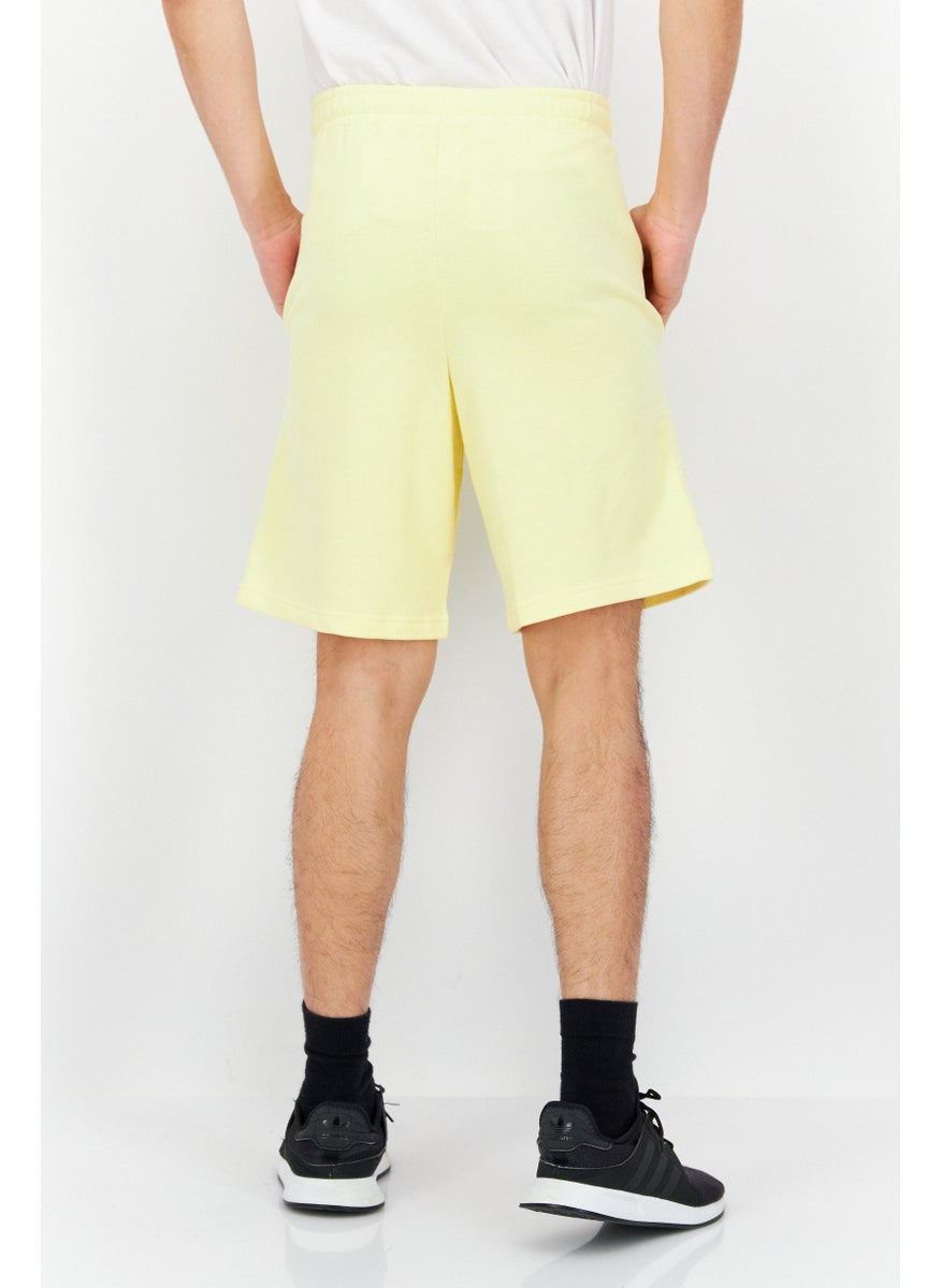 FILA Men Oversized Fit Drawstring Outdoor Short, Yellow  - Image 4