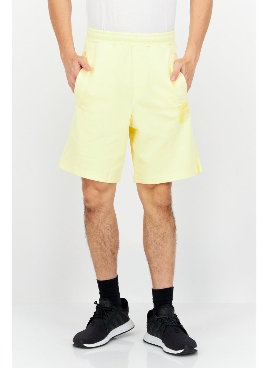 FILA Men Oversized Fit Drawstring Outdoor Short, Yellow  - Image 1