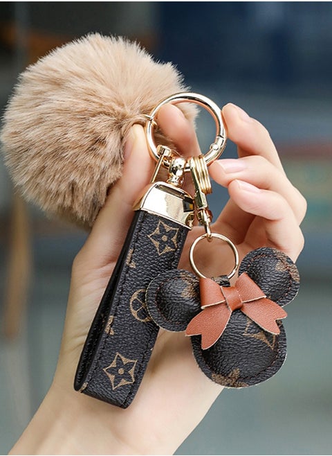 Dark brown  keychain with elegant fluffy fur for women  A great option as a gift  Plaid leather and golden metal keychain includes matching accessories
