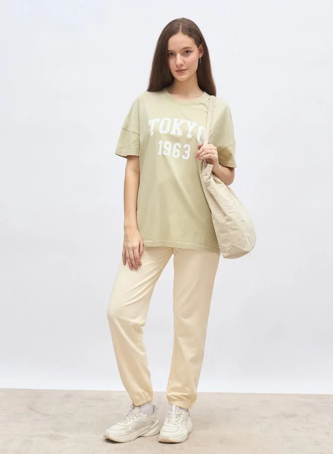 ستايلي Styli Oversized Graphic T-Shirt and Cuffed Joggers Set