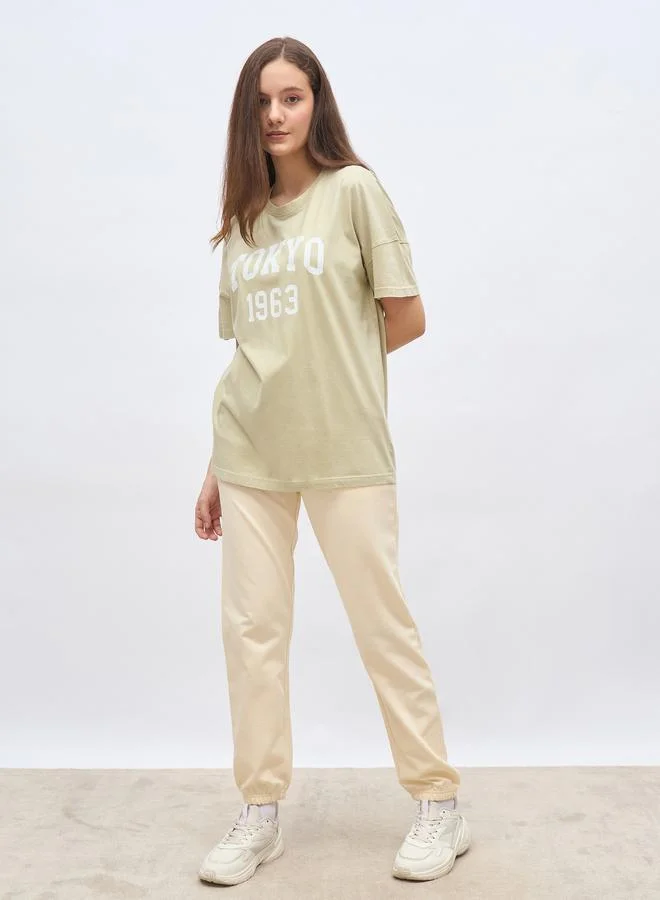 ستايلي Styli Oversized Graphic T-Shirt and Cuffed Joggers Set