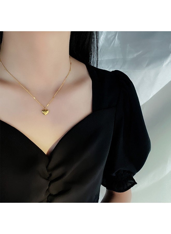 يوكانبي عقد قلب مع سلسلة عظمة الترقوة | تصميم بسيط وأنيق، قلب خوخي من الفولاذ التيتانيوم - Image 3