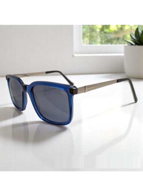 Authentic Armando Cavelli sunglasses, crafted from carefully selected premium acetate for a luxurious look and longevity with extensive use. This model combines modernity and classic style, with a raw blue acetate front and silver -plated metal temples to complete your luxury look. Comes with premium polymer lenses offer UV400 protection in a grey
