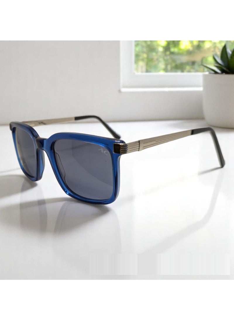 Authentic Armando Cavelli sunglasses, crafted from carefully selected premium acetate for a luxurious look and longevity with extensive use. This model combines modernity and classic style, with a raw blue acetate front and silver -plated metal temples to complete your luxury look. Comes with premium polymer lenses offer UV400 protection in a grey