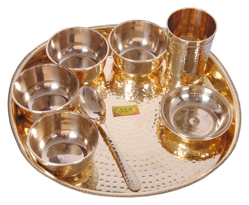 SHIV SHAKTI ARTS Handmade Pure Brass Thali Set 8Pcs Consist of | 4 Brass Bowls 1 Brass Puding Plate 1 Brass Glass 1 Brass Spoon 1 Brass Plate/Hammered Designed Home ware Hotelware Dinnerware Serveware - Image 1