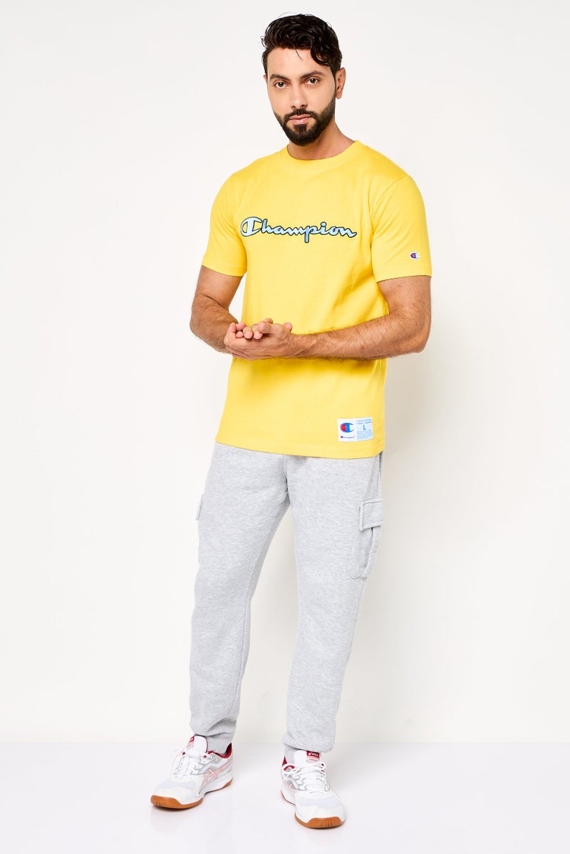 Champion تي شيرت رياضي للرجال بأكمام قصيرة، خارجي، أصفر - Image 2