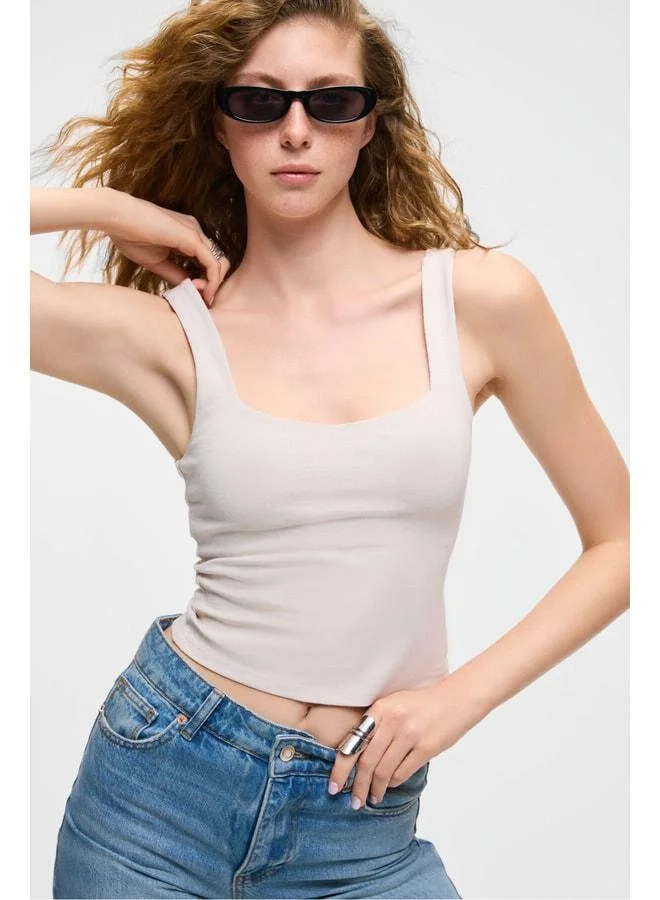 Grimelange Sanuki Women's Slim Short V-Neck Stone-Colored Blouse.
