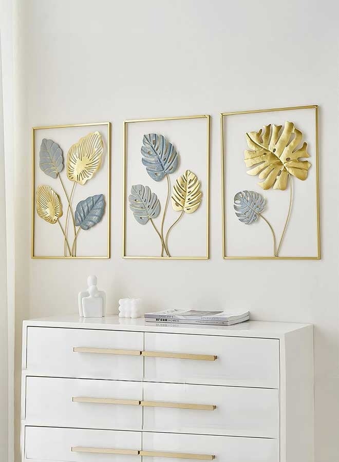 رَوَائِد ديكور جداري معدني ذهبي على شكل أوراق المونستيرا – طقم من 3 قطع، تعليقات جدارية عصرية لتزيين غرفة المعيشة أو غرفة النوم أو الحمام أو المكتب. - Image 1