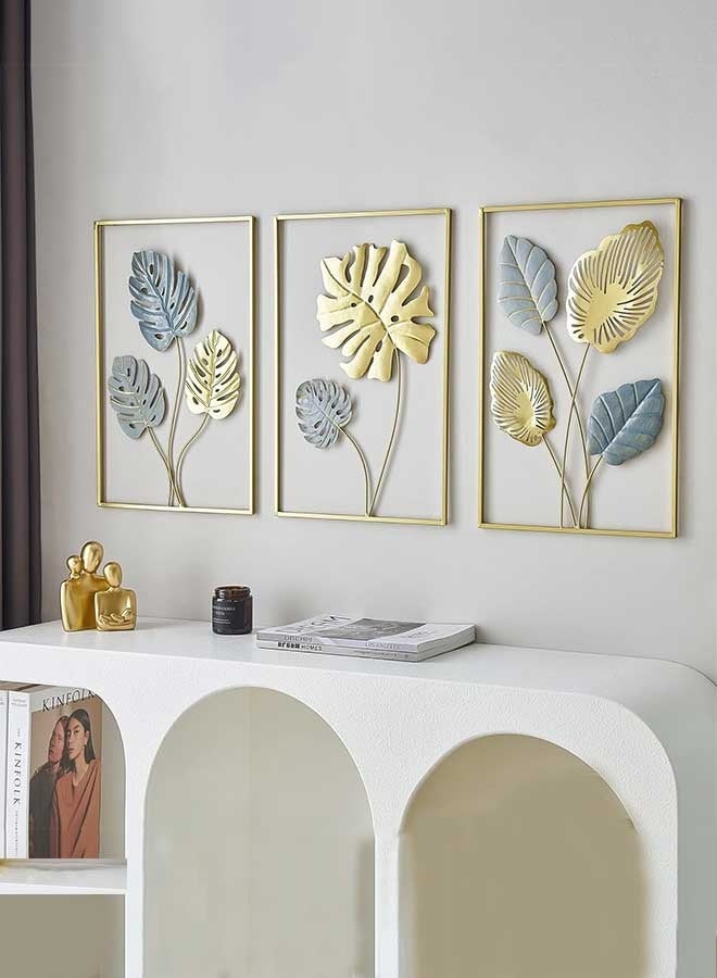 رَوَائِد ديكور جداري معدني ذهبي على شكل أوراق المونستيرا – طقم من 3 قطع، تعليقات جدارية عصرية لتزيين غرفة المعيشة أو غرفة النوم أو الحمام أو المكتب. - Image 4