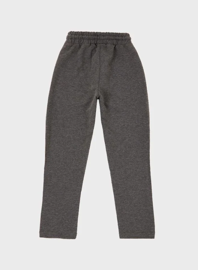 ليلا بنطلون رياضي قطني بخصر برباط وجيوب للأولاد من ليلا