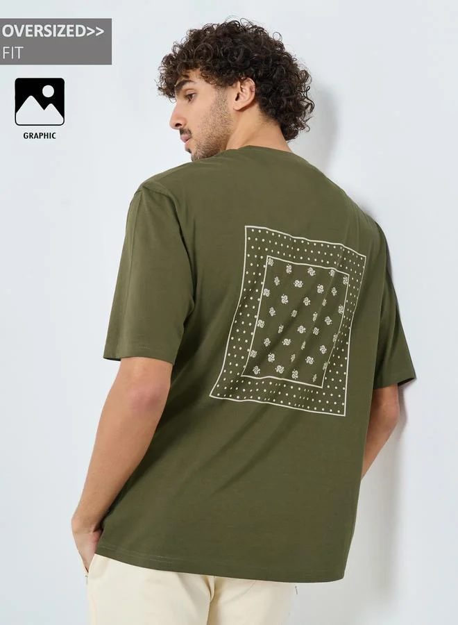 Styli Styli Men Olive Graphic Print Oversized Cotton T-Shirt
