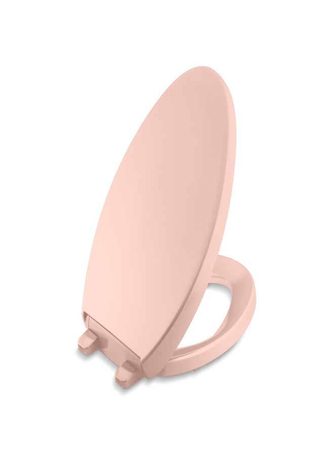 KOHLER K-4008-V10 Reveal Quiet Close Toilet Seat with Grip Tight Bumpers, Elongated, Peachblow - Image 1