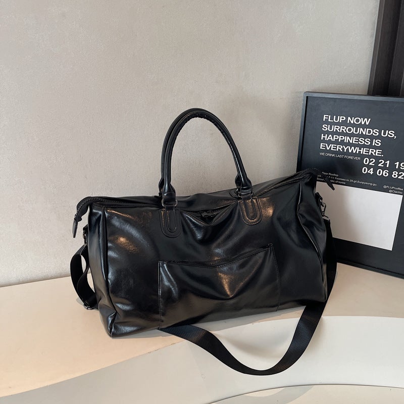 Retro PU Leather Foldable Travel Tote Bag with Large 20-35L Capacity for Men and Women - Image 1