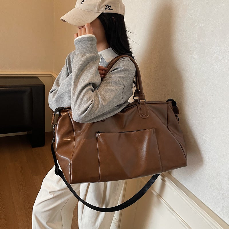 Retro PU Leather Foldable Travel Tote Bag with Large 20-35L Capacity for Men and Women - Image 4