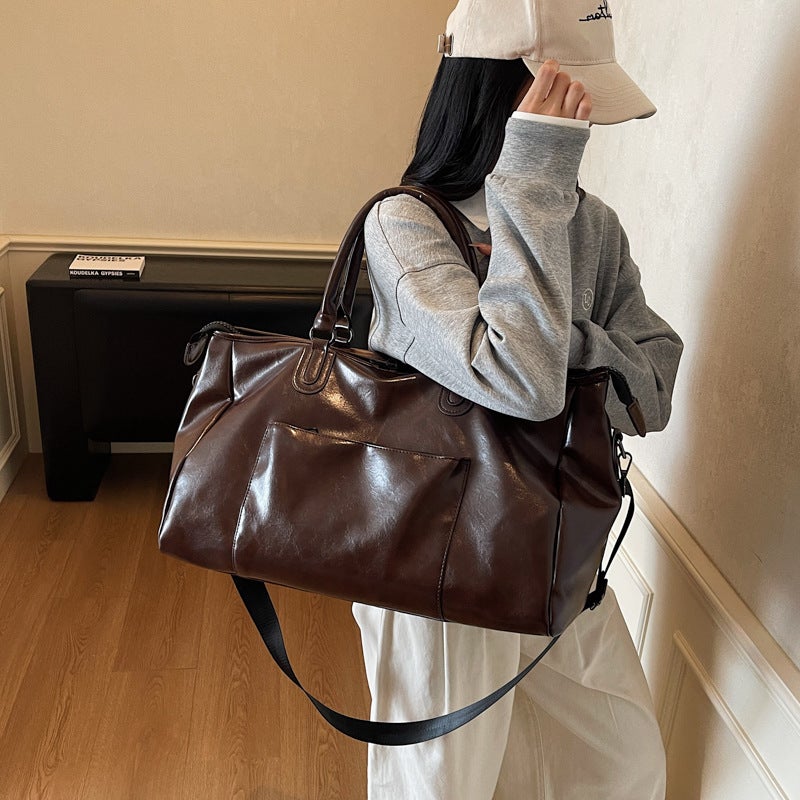 Retro PU Leather Foldable Travel Tote Bag with Large 20-35L Capacity for Men and Women - Image 3