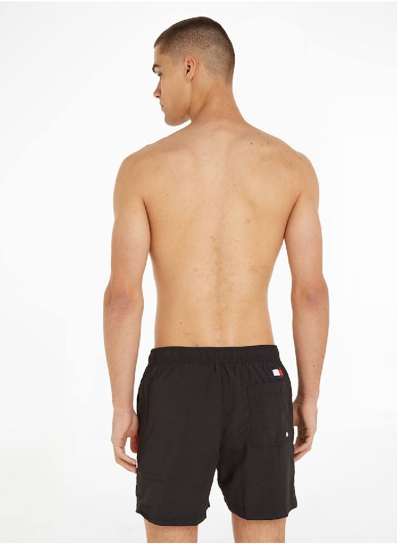TOMMY HILFIGER Men's Flag Mid Length Drawstring Slim Swim Shorts, Black  - Image 3