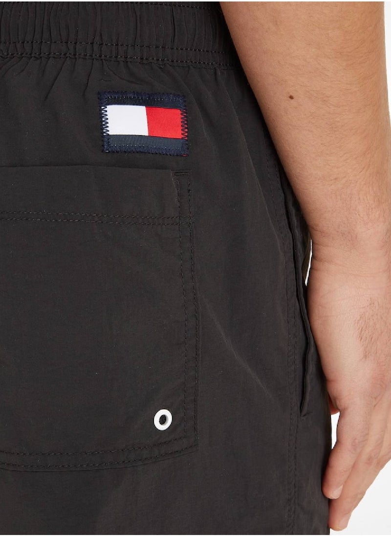TOMMY HILFIGER Men's Flag Mid Length Drawstring Slim Swim Shorts, Black  - Image 4