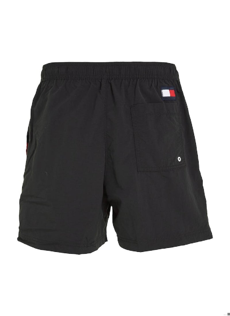 TOMMY HILFIGER Men's Flag Mid Length Drawstring Slim Swim Shorts, Black  - Image 5