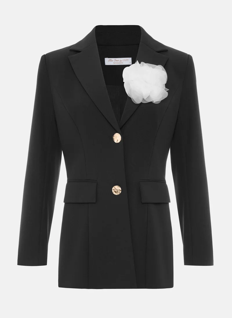 Lichi Fitted jacket with a brooch and contrasting buttons