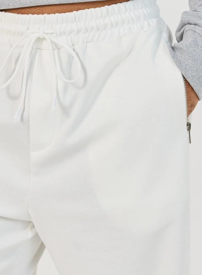 Styli Premium Texture Knitted Pants with  Zipper Pocket Detail