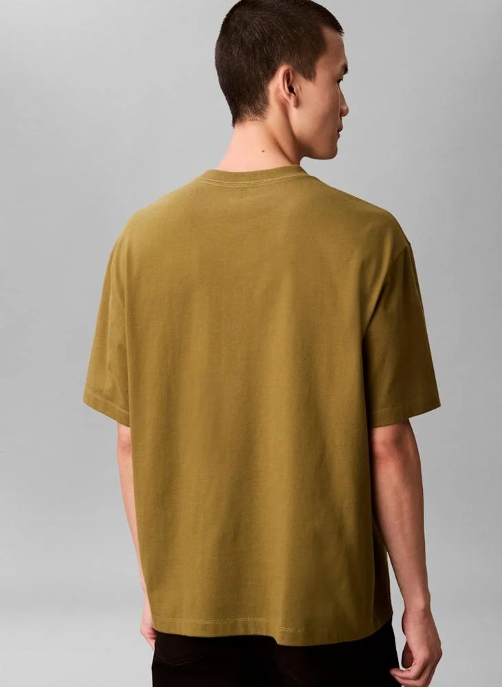 Calvin Klein Jeans  Relaxed Fit Logo Graphic T-Shirt for Men | Best Price UAE