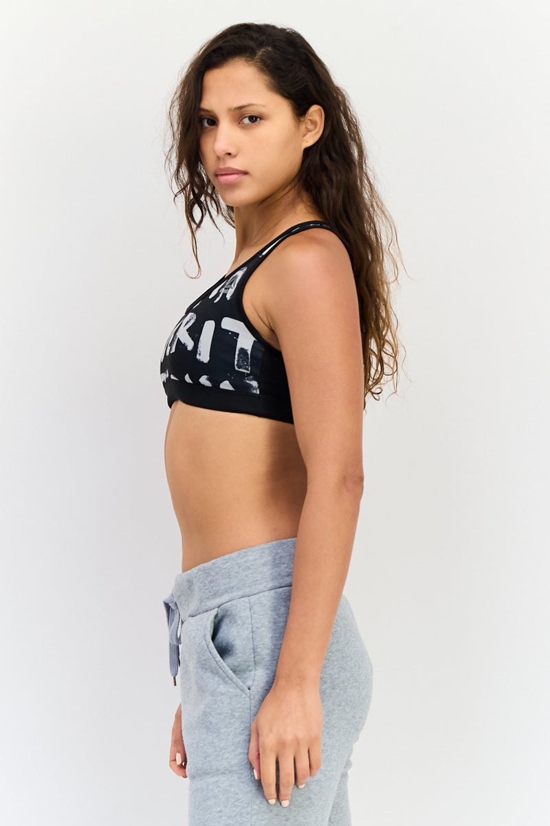 Reebok حمالة صدر رياضية للنساء بدون حشوة بطباعة جرافيك، متعددة الألوان - Image 4