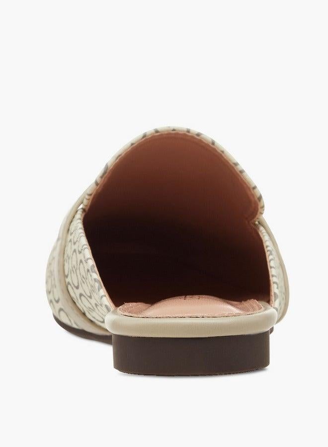 سيليست نعال نسائية سهلة الارتداء بطبعة شعار مع لمسة معدنية - Image 5