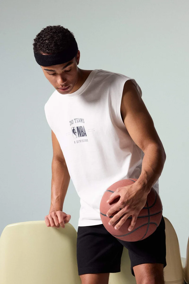 ديفاكتو NBA Wordmark Printed Oversize Tank Top