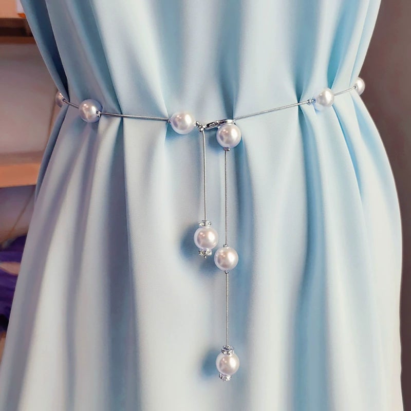 A minimalist and stylish pearl waist chain that pairs well with various dresses, perfect for summer body shaping and adding an elegant touch. - Image 1