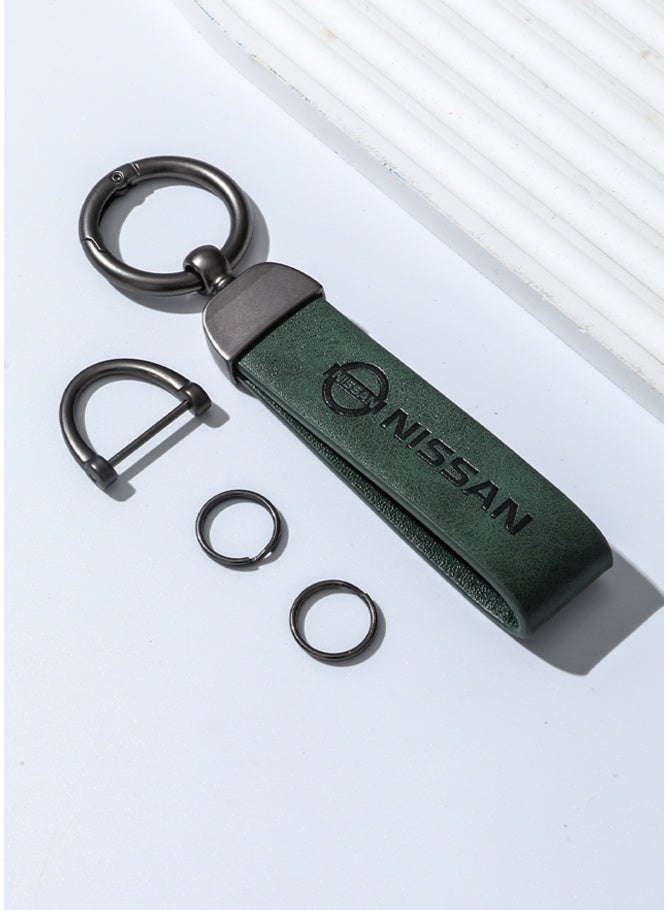 KeyAmor Luxurious Leather & Metal Keychain – green Edition with Nissan Logo Elegant green metal and leather keychain car key holder for adults. Stylish car keychain with 3 key rings, featuring the iconic Nissan logo, perfect as a fancy gift or car accessory. Designed in a sleek green colour for a refined and modern look, it offers 360-degree rotation for added convenience, is suitable for both men and women, and comes beautifully packaged in a fancy gift box.  - Image 2