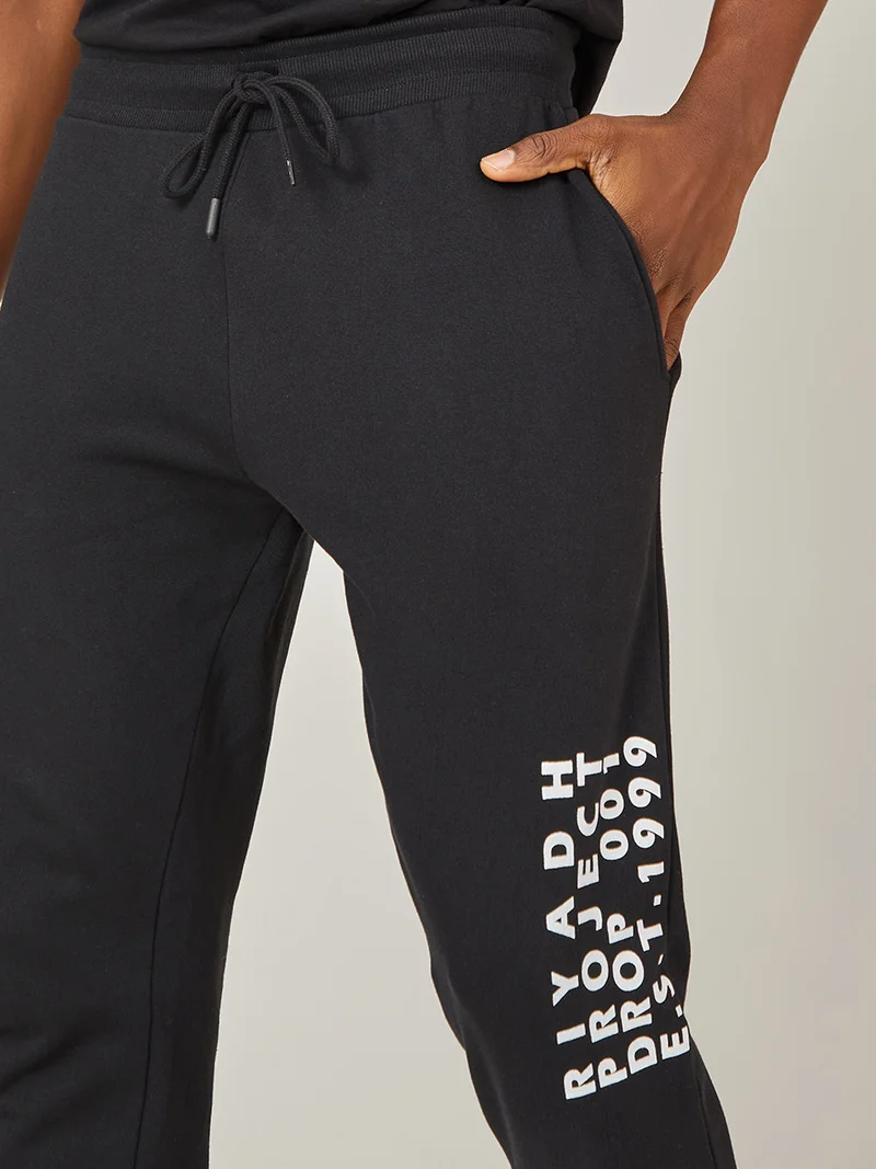 Styli Text Print Detail Slim Fit Jogger with Pockets
