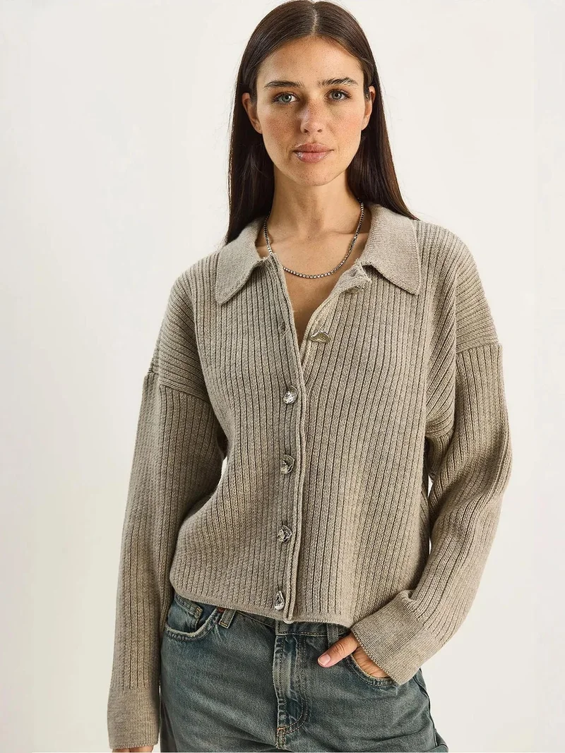 بيانكو لوتشي كارديجان لوكسي محبوك بأزرار