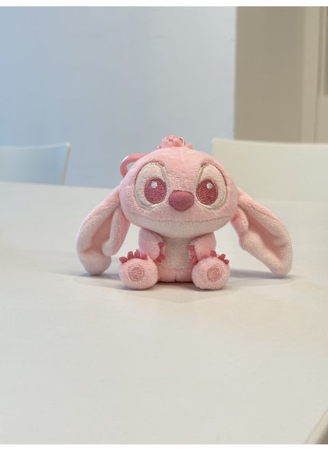 A 3-inch plush pendant featuring Disney's Stitch in a cute pink design, perfect for adding charm to your bag.