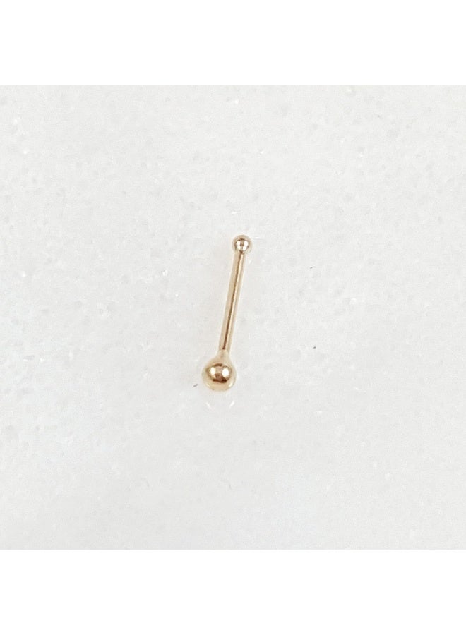 Luxuria These gold nose rings for women feature a simple and elegant design. Their small, delicate size creates a subtle yet understated look, while a small gold ball adds a touch of feminine charm. The design is suitable for everyday wear and easily complements various outfits. - Image 3