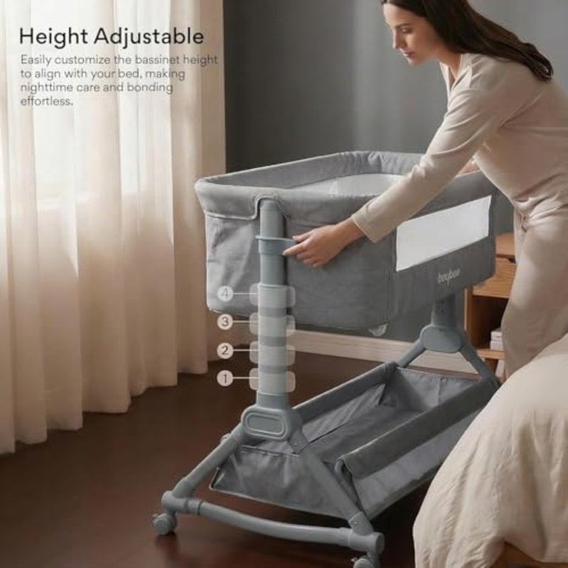 Bedside sleeper for newborns and infants, made of breathable polyester and sturdy steel frame, grey color, features 4-height adjustment, rocking mode, mosquito net, storage basket, and smooth-rolling wheels - Image 5