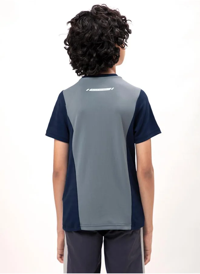 تكنوسبورت Contrast Panel Round Neck Slim Fit T-Shirt by Styli