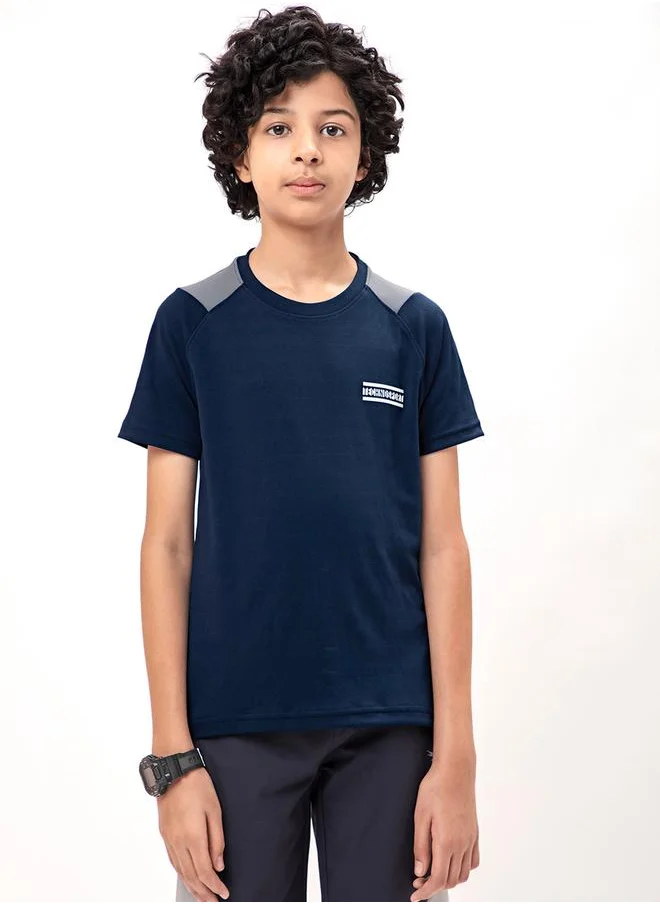 تكنوسبورت Contrast Panel Round Neck Slim Fit T-Shirt by Styli