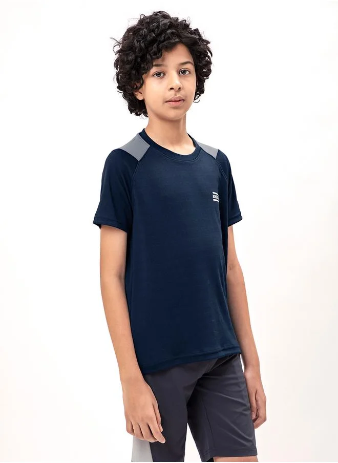 تكنوسبورت Contrast Panel Round Neck Slim Fit T-Shirt by Styli