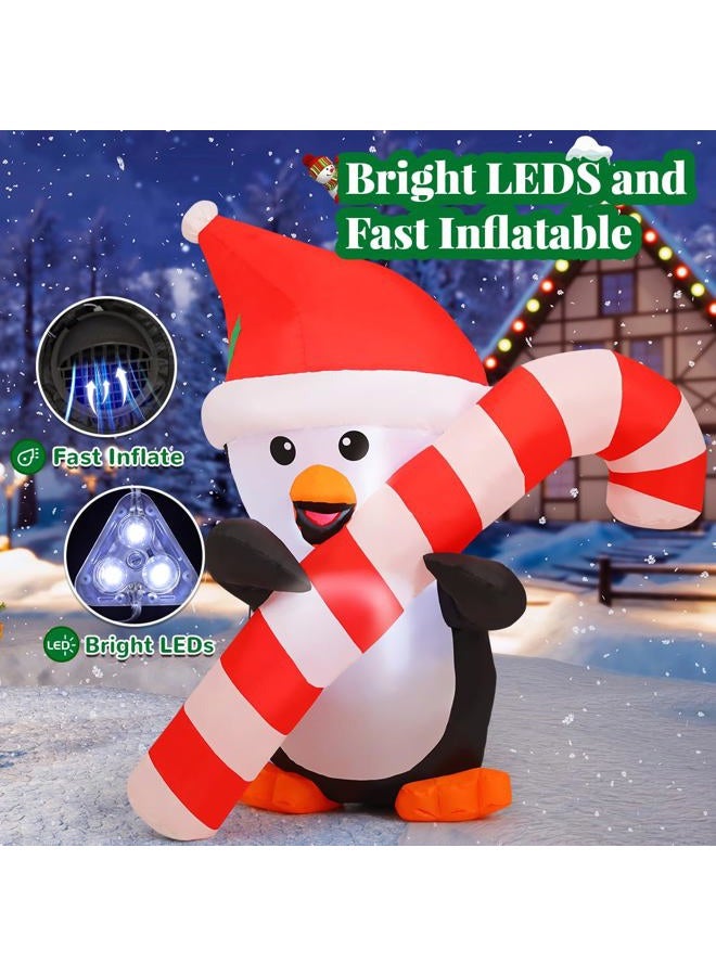 GOOSH 5 FT Height Christmas Inflatables Outdoor Penguin with Cane, Blow Up Yard Decoration Clearance with LED Lights Built-in for Holiday/Christmas/Party/Yard/Garden - Image 2