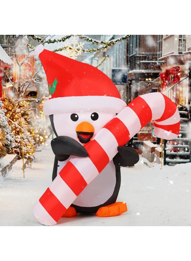 GOOSH 5 FT Height Christmas Inflatables Outdoor Penguin with Cane, Blow Up Yard Decoration Clearance with LED Lights Built-in for Holiday/Christmas/Party/Yard/Garden - Image 4