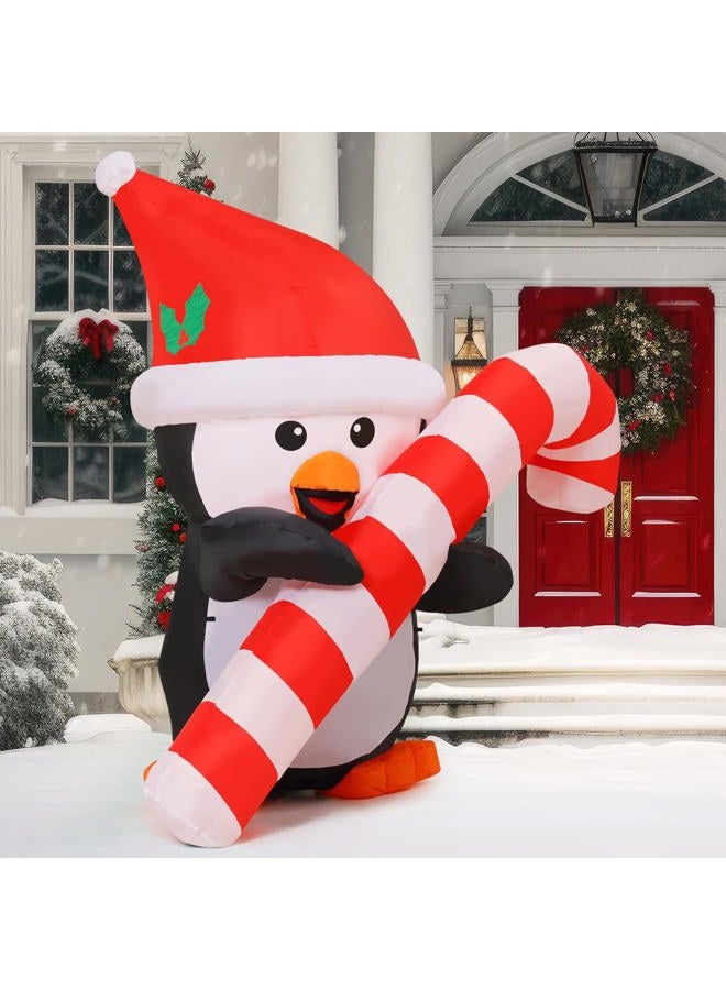 GOOSH 5 FT Height Christmas Inflatables Outdoor Penguin with Cane, Blow Up Yard Decoration Clearance with LED Lights Built-in for Holiday/Christmas/Party/Yard/Garden - Image 3