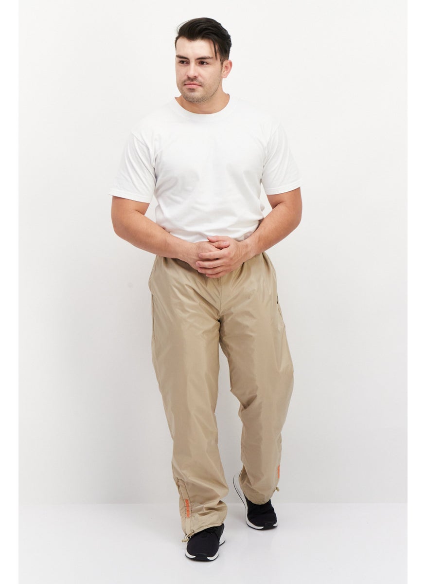 FILA - Men Sportswear Fit Brand Logo Training Track Pants, Beige - Image 1