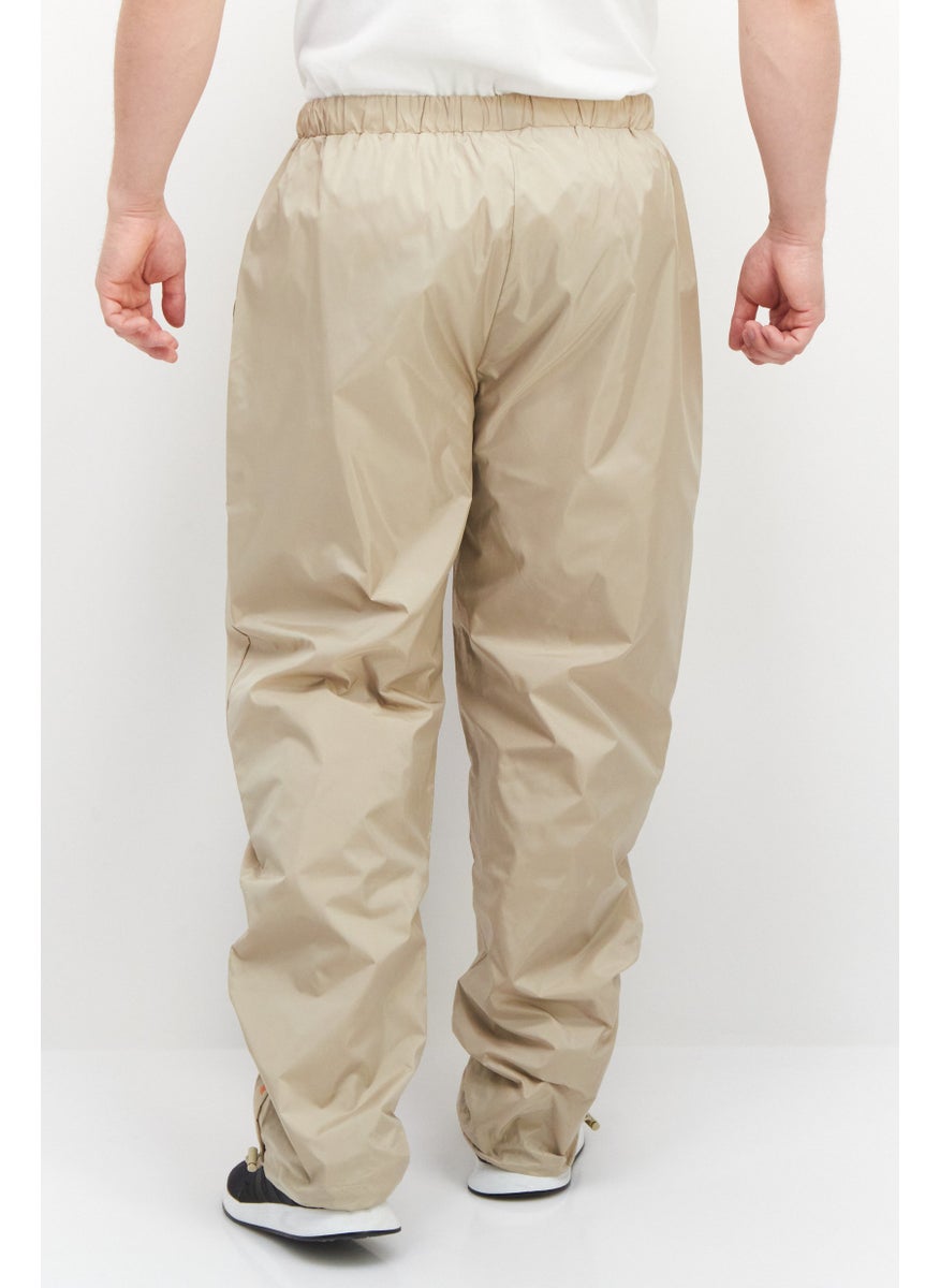 FILA - Men Sportswear Fit Brand Logo Training Track Pants, Beige - Image 1