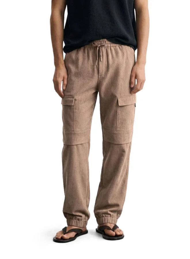ذا انديان كراج كو Men Relaxed Fit Solid Zipper Pocket Mid-Rise Cuffed Joggers