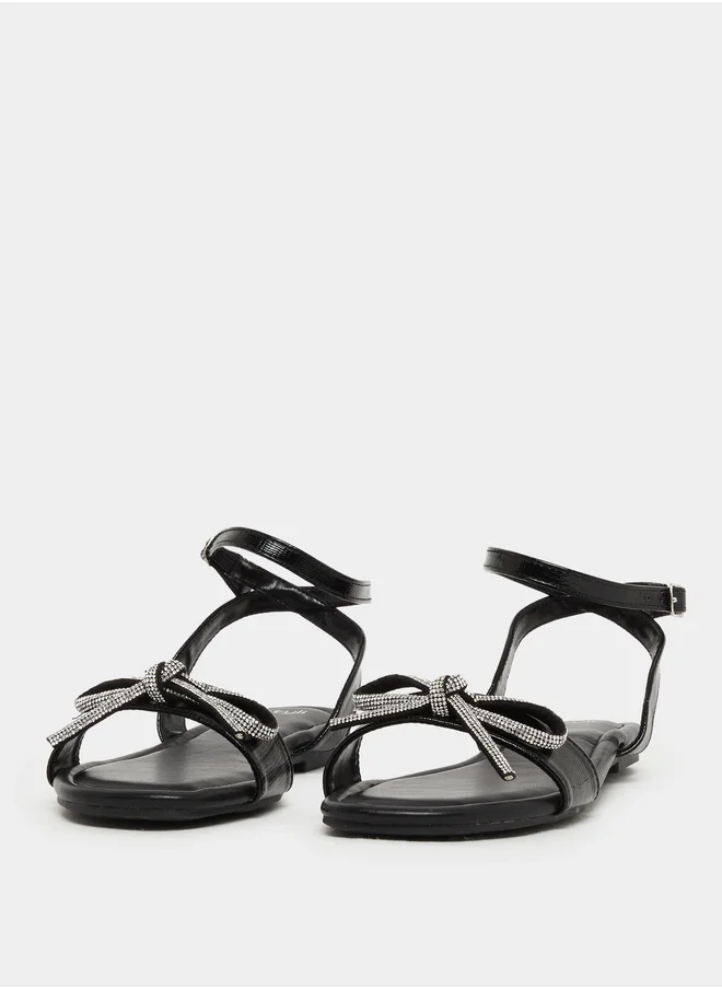 Styli Embellished Bow Detail Ankle Strap Flat Sandals
