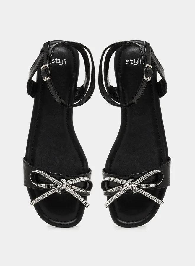 Styli Embellished Bow Detail Ankle Strap Flat Sandals